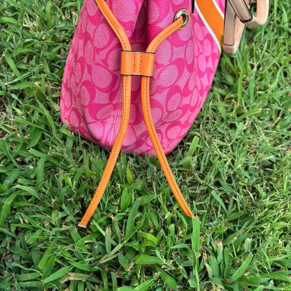 Coach Signature Canvas Drawstring Tote in Pink and Orange
